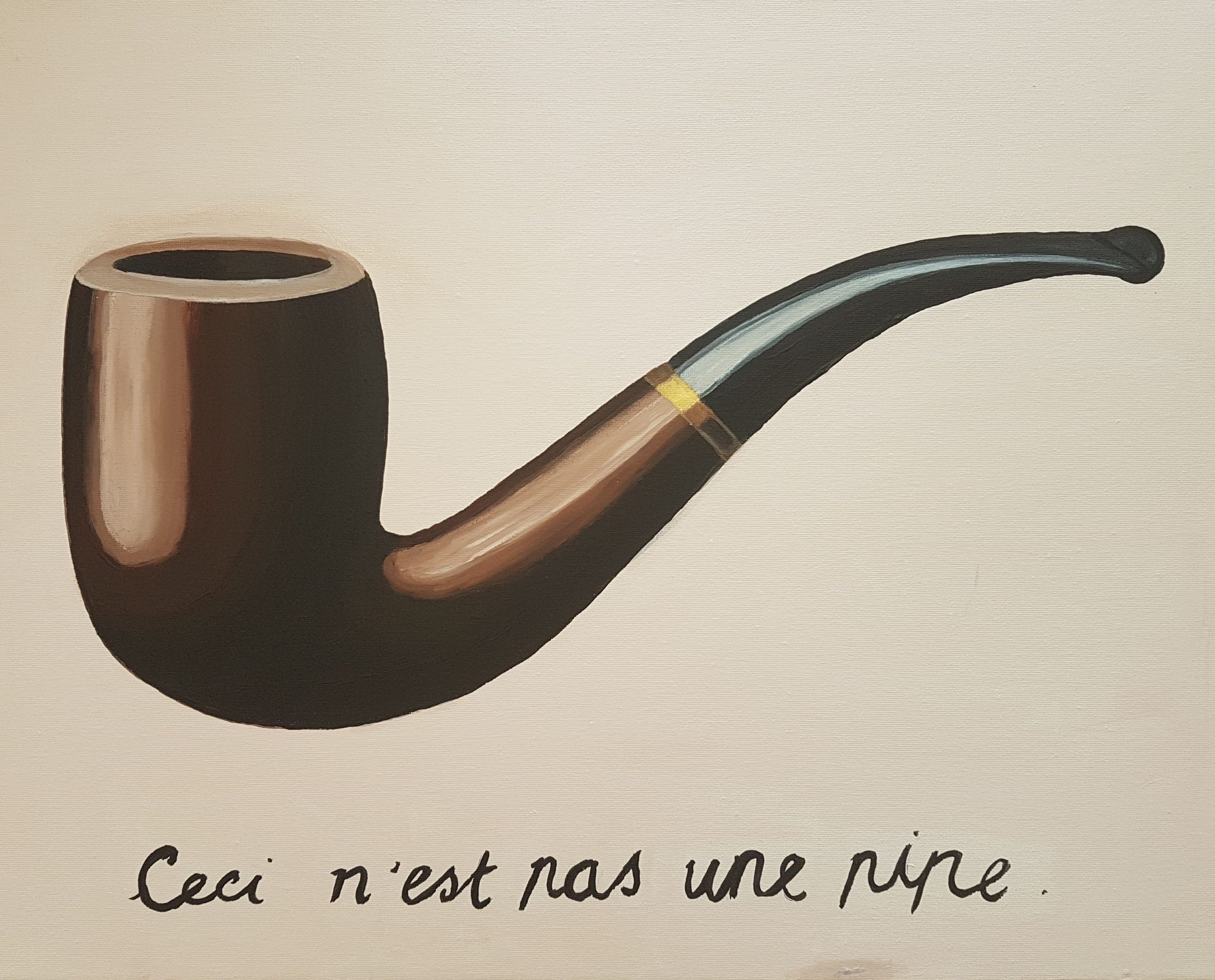 The Treachery of Images by René Magritte